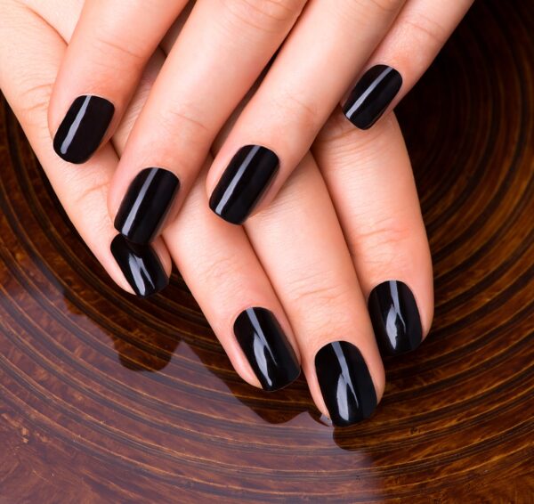 beautiful-women-hands-with-black-manicure-after-spa-procedures-spa-treatment-concept