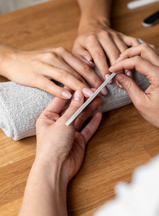 hands-holding-nail-file-close-up